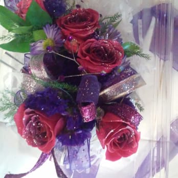Merced Floral - I sent her a picture of the dress and she made this using the colors off the dress!!! Love it!!! - Florists Near Me - Merced, California Merced Floral - I sent her a picture of the dress and she made this using the colors off the dress!!! Love it!!! - Florists Near Me - Merced, California