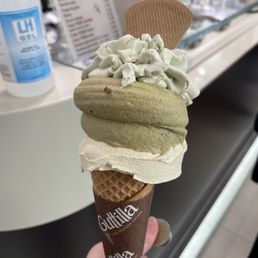 Crema della nonna and pistachio gelato with pistachio whipped cream. Crema della nonna and pistachio gelato with pistachio whipped cream.