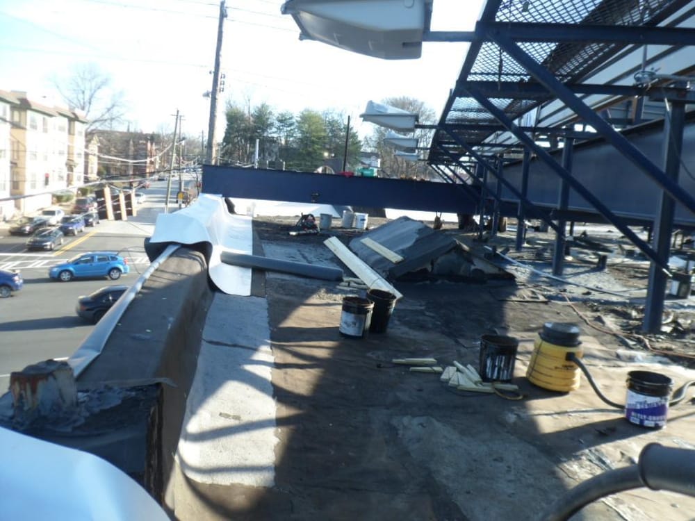 Slide of Astro Roofing Repairs