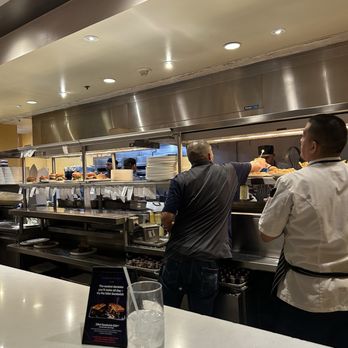 Gordon Ramsay Burger Las Vegas - The "executive chef" on the right who ignored us the entire time even though I paid for the "chef's experience". - Burgers Near Me - Las Vegas, Nevada
