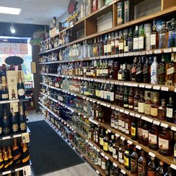 Vic's Liquor Store - Our Liquor selection has all the usual big names with an expanding selection of obscure, top-shelf bourbons and blends.