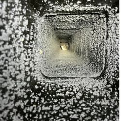 The Stoveman - Looking down the chimney from the top. The liner should reach all the way to the top, about 25 feet. He installed a 4 foot liner.