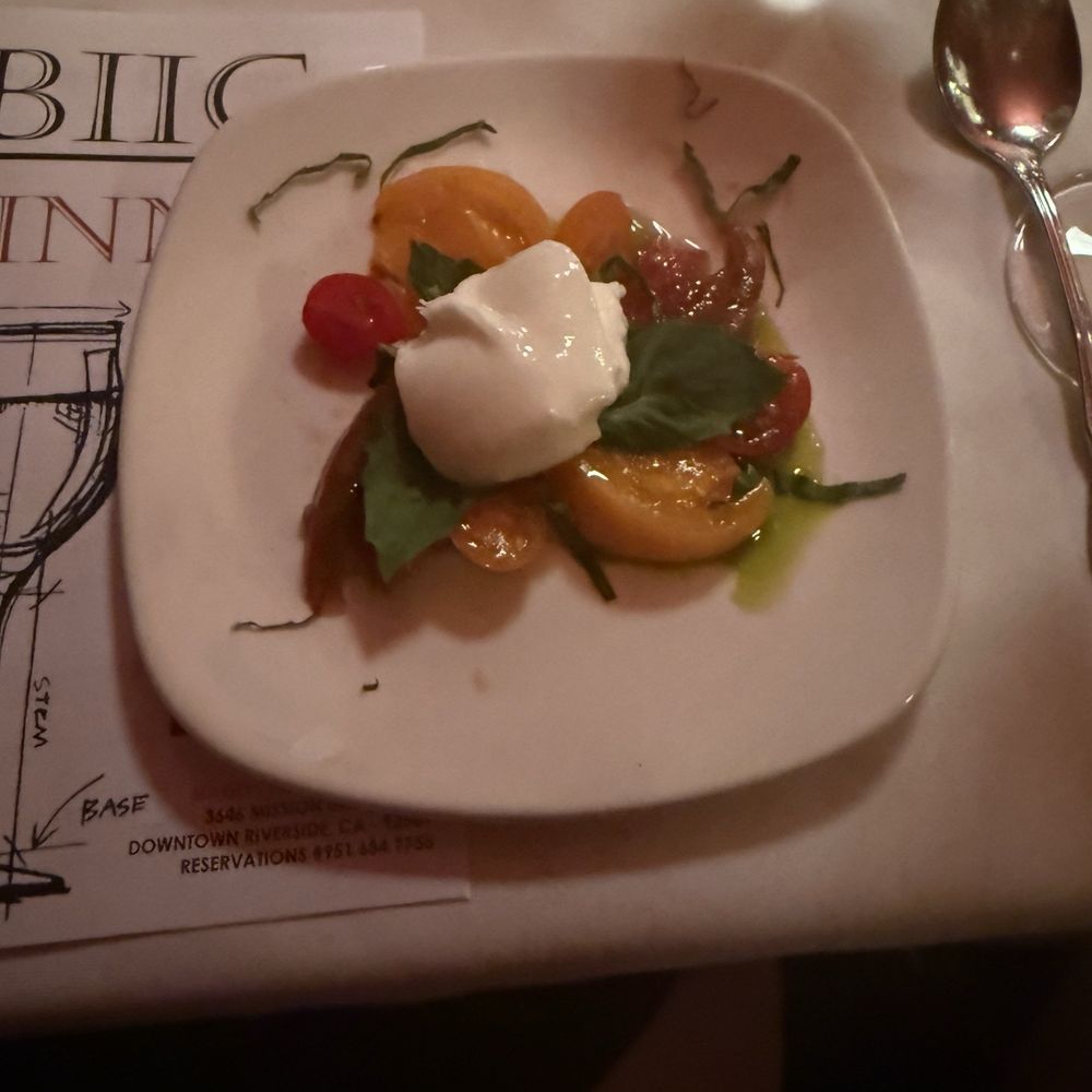 Marios Place - Amuse. Caprese of local butrata and local heirloom tomatoes. - Italian Near Me - Riverside, California Marios Place - Amuse. Caprese of local butrata and local heirloom tomatoes. - Italian Near Me - Riverside, California