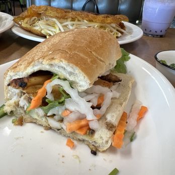 Pho Van - BÁNH MÌ GÀ HOẠC HEO NƯỚNG $7.75 Chicken sandwich with daikon, pickled carrots, mayonnaise, pâté, cucumber, cilantro, and jalapeño peppers. - Vietnamese Near Me - Windsor, Connecticut Pho Van - BÁNH MÌ GÀ HOẠC HEO NƯỚNG $7.75 Chicken sandwich with daikon, pickled carrots, mayonnaise, pâté, cucumber, cilantro, and jalapeño peppers. - Vietnamese Near Me - Windsor, Connecticut