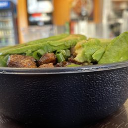 a bowl of food on a table a bowl of food on a table