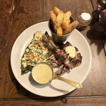 The Punchbowl - Pork tomahawk - Pubs Near Me - Mayfair, XGL The Punchbowl - Pork tomahawk - Pubs Near Me - Mayfair, XGL
