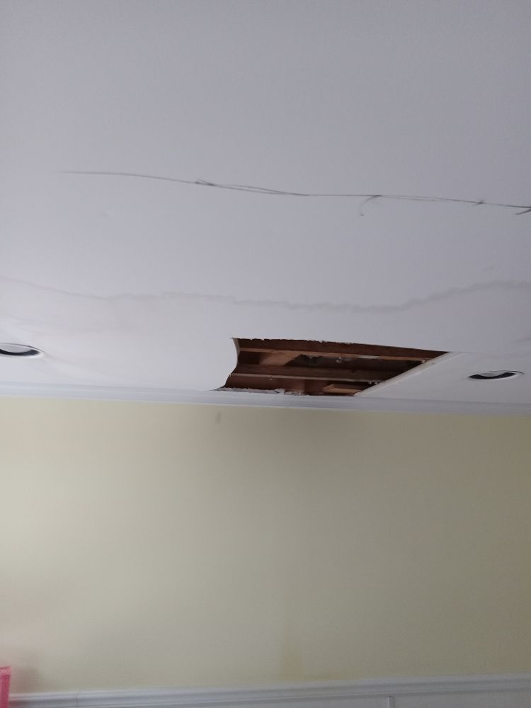 Slide of J&S handyman helping hands