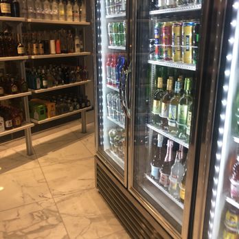 The Goods - a display of alcohol bottles in a store - Tobacco Shops Near Me - Las Vegas, Nevada The Goods - a display of alcohol bottles in a store - Tobacco Shops Near Me - Las Vegas, Nevada