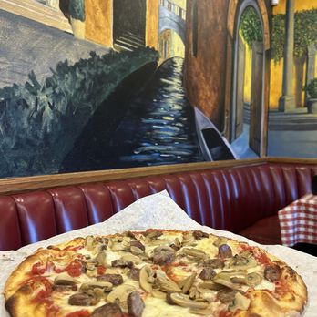 Pinocchio Restaurant - Sausage & Mushroom pizza - Italian Near Me - Burbank, California Pinocchio Restaurant - Sausage & Mushroom pizza - Italian Near Me - Burbank, California