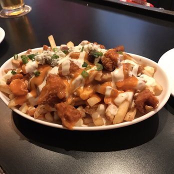 The Loose Moose - Buffalo chicken poutine - Sports Bars Near Me - Toronto, Ontario The Loose Moose - Buffalo chicken poutine - Sports Bars Near Me - Toronto, Ontario