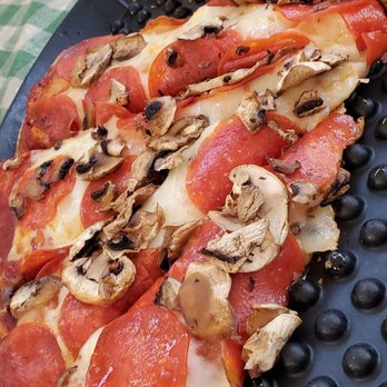 Pizza Bell - pepperoni, mushrooms, and cheese on a pizza pan - Pizza Near Me - Elk Grove, California Pizza Bell - pepperoni, mushrooms, and cheese on a pizza pan - Pizza Near Me - Elk Grove, California