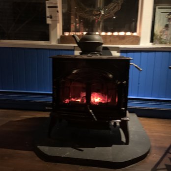 The Bellport - Wood burning stove, right next to our table - New American Near Me - Bellport, New York The Bellport - Wood burning stove, right next to our table - New American Near Me - Bellport, New York