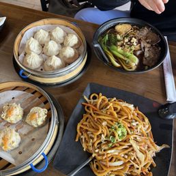 A1. House Special Pork Soup Filled Dumplings D2. Shanghai Fried Noodles