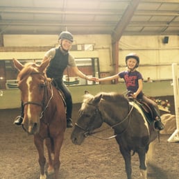 Mom and daughter enjoying our riding lesson!