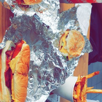 Five Guys - 2 Bacon Cheeseburgers, an order of Cajun Fries, and a Bacon Cheese Dog - Burgers Near Me - Crystal Lake, Illinois