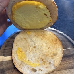 Egg & Cheese on a roll. One Egg, one slice of cheese. Pitiful. Egg & Cheese on a roll. One Egg, one slice of cheese. Pitiful.