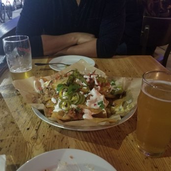 Simmzy's - The nachos were amazing but be ready for some crunchy corn. Turkey patty a little spicy but yummy, Great location, will come again soon! - Gastropubs Near Me - Long Beach, California