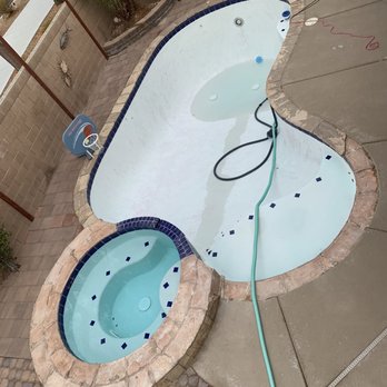 Trident Pool Plaster & Renovation - Before (old flagstone) - Pool & Hot Tub Service Near Me - Las Vegas, Nevada Trident Pool Plaster & Renovation - Before (old flagstone) - Pool & Hot Tub Service Near Me - Las Vegas, Nevada
