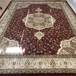 Aladdin Rugs Design Center - New rug laid out in living room (Straight)