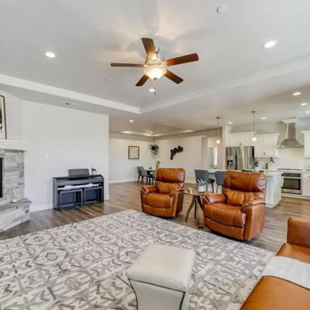 Flooring America - a living room with a ceiling fan - Flooring Near Me - Redding, California Flooring America - a living room with a ceiling fan - Flooring Near Me - Redding, California