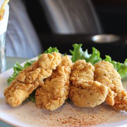 Just order from our menu at concessions, and we'll buzz you when your food is ready, to take to your seat!