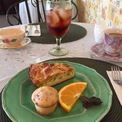 Susie K's Cafe & Tea Room - Blueberry muffin, broccoli cheddar quiche, and fruit with raspberry iced tea and coffee