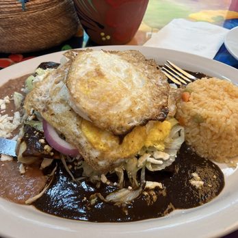 El Mariachi - Chicken mole enchiladas with 2 fried eggs on top - Mexican Near Me - Glassboro, New Jersey