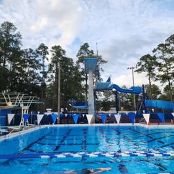 H Spurgeon Cherry Pool - The diving well with springboards and platform tower, January 2024.