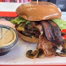 Mr Juicy - Double cheeseburger with bacon jalapeños mushrooms and grilled onions with wet sauce on the side