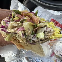 Can you find the meat? Terrible that they give you a wrap full of vegetables when you pay $24 for a lamb and beef wrap. Rip off Can you find the meat? Terrible that they give you a wrap full of vegetables when you pay $24 for a lamb and beef wrap. Rip off