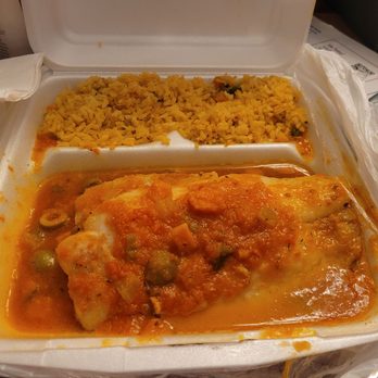 Merida Restaurant - Redfish has 2 generous portions along with Charo beans and rice - Mexican Near Me - Houston, Texas