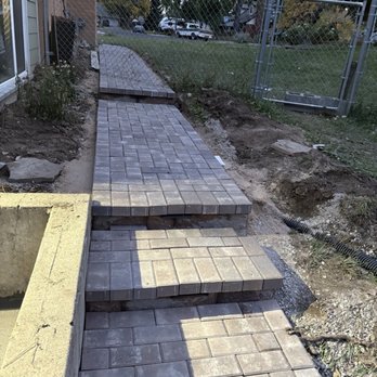 Kettle River - Stairs with built in solar lights for safety and connect from back patio up to walkway that connects to front door. - Masonry/Concrete Near Me