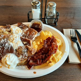 Bagels & Brew - Stuffed French Toast: cinnamon brioche layered with churro cheese & drizzled with caramel sauce and whip cream with eggs and bacon - Bagels Near Me - Lake Forest, California Bagels & Brew - Stuffed French Toast: cinnamon brioche layered with churro cheese & drizzled with caramel sauce and whip cream with eggs and bacon - Bagels Near Me - Lake Forest, California