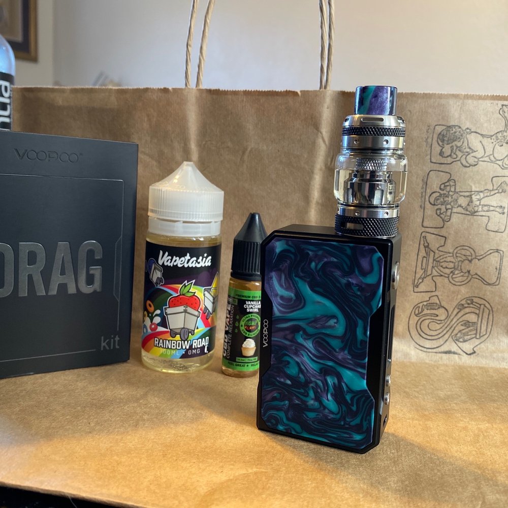 VooPoo DRAG mod kit in turquoise, Vapetasia in Rainbow Road (tastes like Fruit Loops), & Hemp Bombs CBD eLiquid VooPoo DRAG mod kit in turquoise, Vapetasia in Rainbow Road (tastes like Fruit Loops), & Hemp Bombs CBD eLiquid