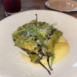 Charred Blooming Junction Shishito Peppers | roasted garlic aioli, sweet corn vinaigrette, cacio de bosco Charred Blooming Junction Shishito Peppers | roasted garlic aioli, sweet corn vinaigrette, cacio de bosco
