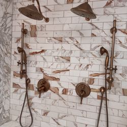 Jennings Plumbing Services - New his and hers shower valves and shower heads