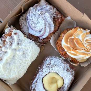 The Big Island Bakehouse - Cinnamon Bun with Whipped Cream Cheese Frosting, Ube Cronut, Lemon Meringue Cruffin, Bambolini - Bakeries Near Me - Keaau, Hawaii