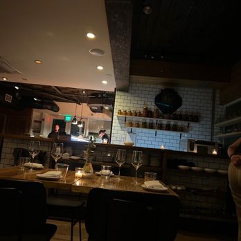 Ariete - Kitchen. View fro lm our table inside - New American Near Me - Miami, Florida Ariete - Kitchen. View fro lm our table inside - New American Near Me - Miami, Florida