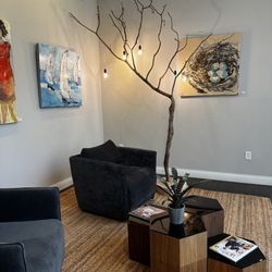 The Art of Touch Therapeutic Massage Center - Art gallery and sitting area