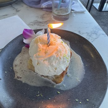 Fleur Cuisine - Candle and card with my birthday dessert, Rum cake a la mode - Caribbean Near Me - Rockport, Massachusetts Fleur Cuisine - Candle and card with my birthday dessert, Rum cake a la mode - Caribbean Near Me - Rockport, Massachusetts