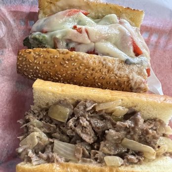Johnny Longhots - Yo Adrian and Cooper Sharp cheesesteak - Sandwiches Near Me - Sarasota, Florida Johnny Longhots - Yo Adrian and Cooper Sharp cheesesteak - Sandwiches Near Me - Sarasota, Florida