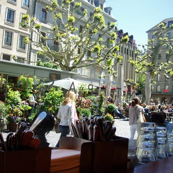 Globus Delicatessen - Geneva, Globus Delikatessen Restaurant. View from inside restaurant over Place Du Molard. - Food Stands Near Me - Geneva, GE