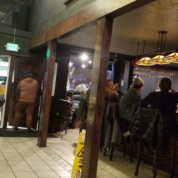 Chalice Brewing - people sitting at the bar - Breweries Near Me - Coeur d'Alene, Idaho