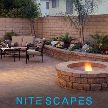 Nite Scapes - a patio with a fire pit - Landscaping Near Me - Orem, Utah