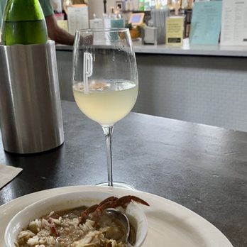 The Mayhaw Bar - Chilled wine bottle in nice cooler; French 75 (yum!) cocktail, gumbo from Elysian Seafood. - Beer, Wine & Spirits Near Me - New Orleans, Louisiana
