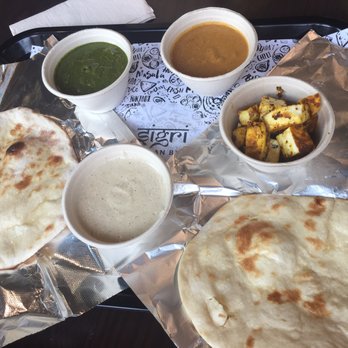 Sigri Indian BBQ - Regular and garlic naan with three different sauces and cheese - Indian Near Me - Newark, New Jersey Sigri Indian BBQ - Regular and garlic naan with three different sauces and cheese - Indian Near Me - Newark, New Jersey