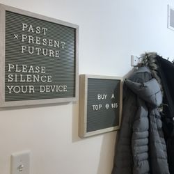 Coat area and some signs