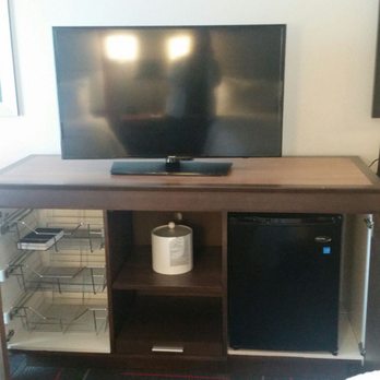 Hampton Inn and Suites Columbus Scioto Downs - Fridge, tv, rolling ottoman, storage ... - Hotels Near Me - Columbus, Ohio