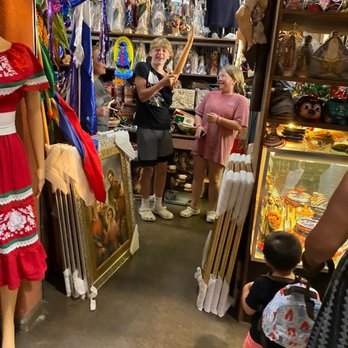 Plaza Mariachi - a woman in a mexican dress in a store - Cultural Center Near Me - Nashville, Tennessee Plaza Mariachi - a woman in a mexican dress in a store - Cultural Center Near Me - Nashville, Tennessee