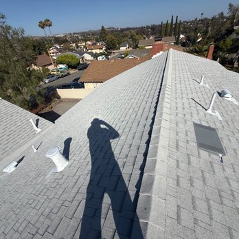 Pat & Sun Roofing - looking across ridge, you can see the shadown of the ridge vent. Joe added an O'Hagin vent where I had an attic fan in place - Roofing Near Me - San Diego, California Pat & Sun Roofing - looking across ridge, you can see the shadown of the ridge vent. Joe added an O'Hagin vent where I had an attic fan in place - Roofing Near Me - San Diego, California